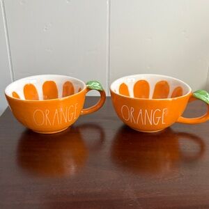 Rae Dunn Orange Shaped Juice Mug Set of 2 from the Magenta Artisan Collection.